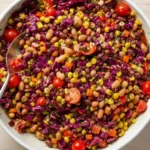 Dense bean salad in rustic bowl