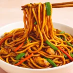 Saucy Garlic Chicken Lo Mein in White Bowl